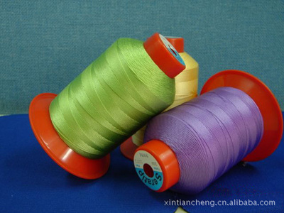 青岛新天成纺织 厂家直销优质短纤缝纫线与涤纶阻燃纱
